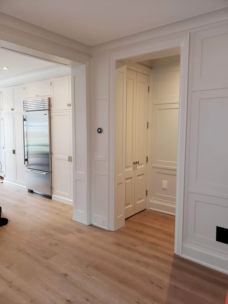 Interior wall and trim painting in a Toronto home by Belardi Brothers